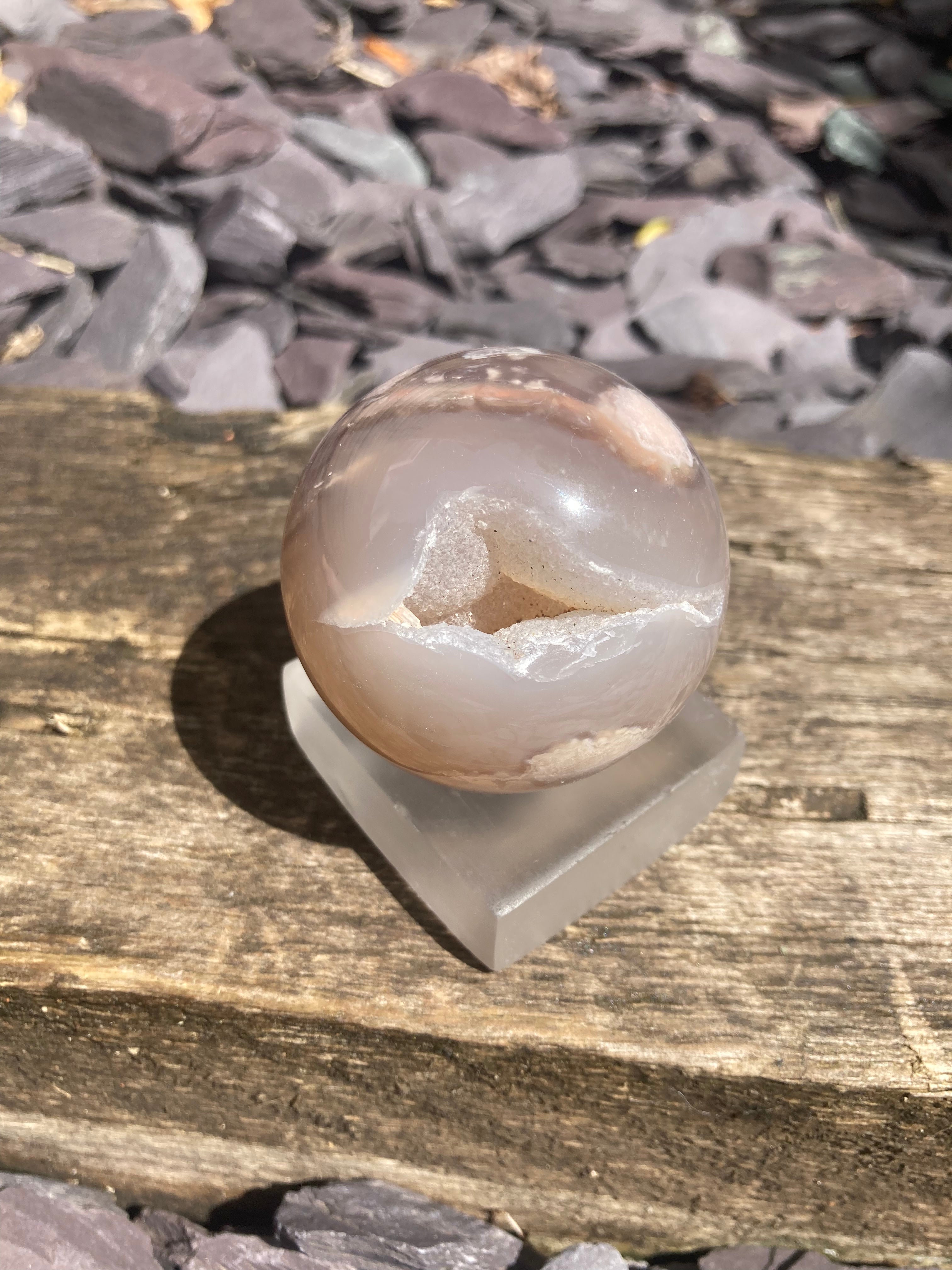 A stunning Flower Agate sphere with sugary druzy