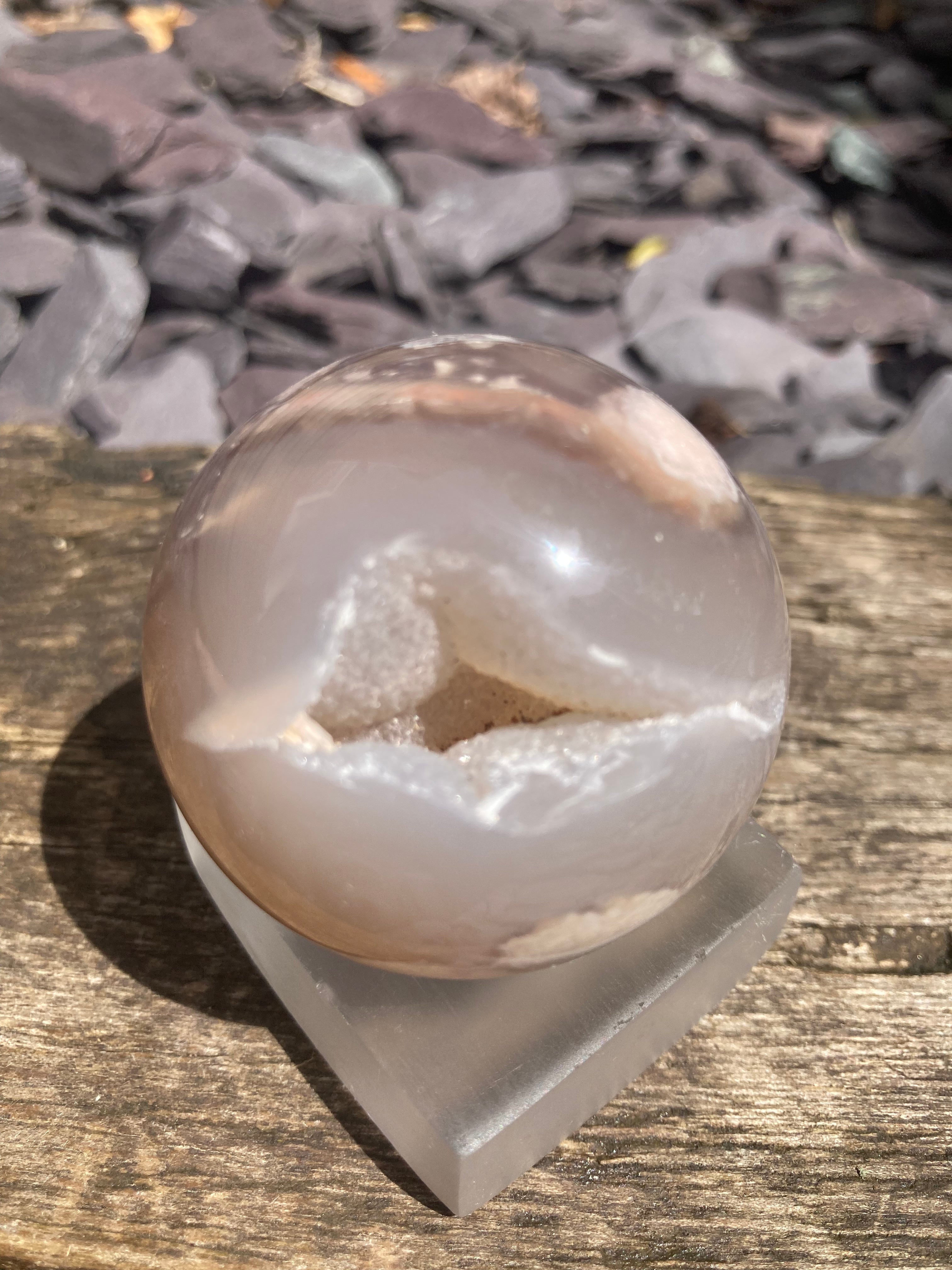 A stunning Flower Agate sphere with sugary druzy