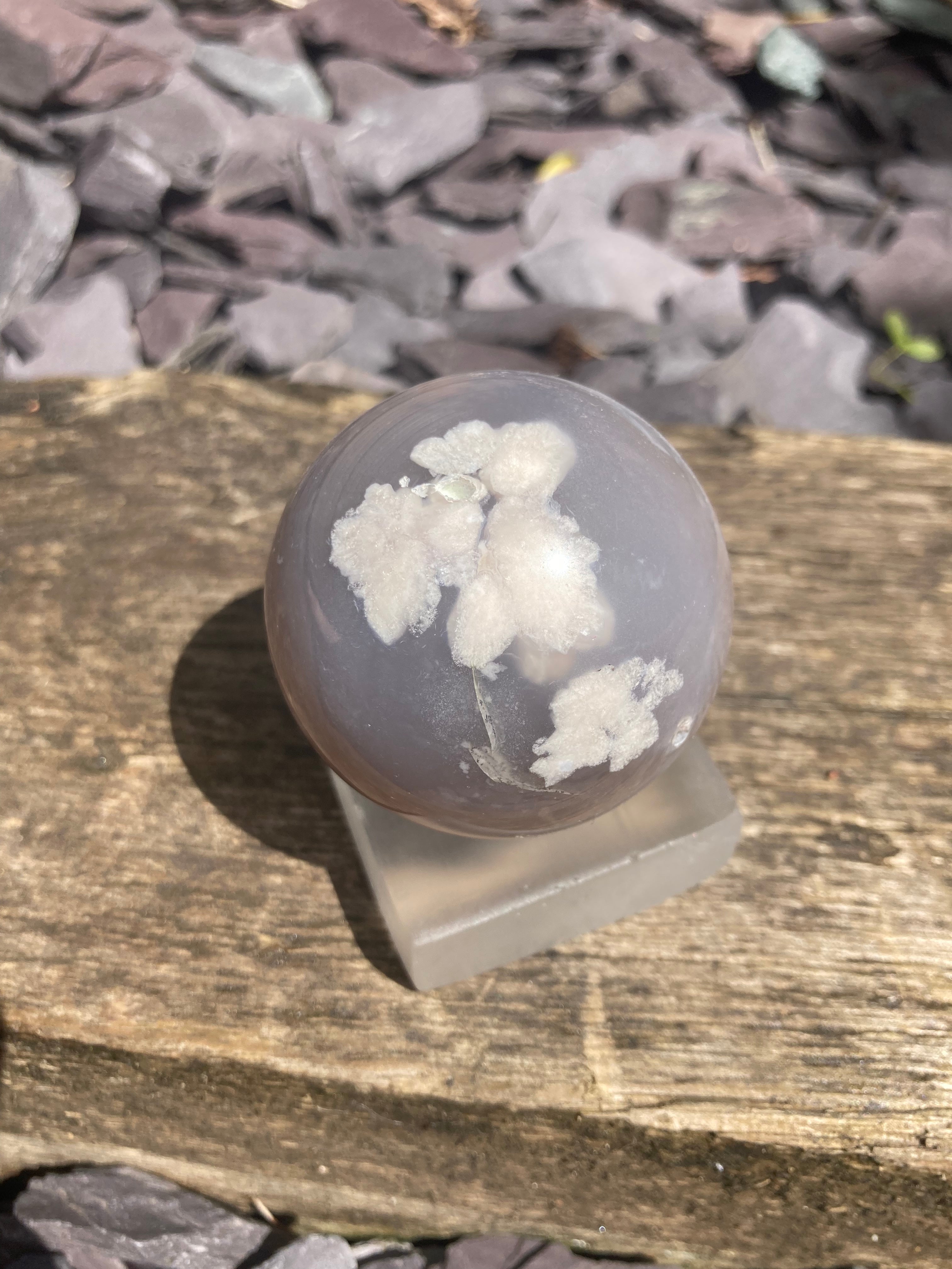 Dark blue Flower agate sphere with druzy