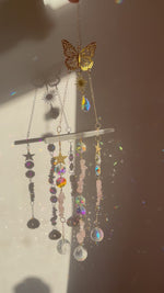 Load and play video in Gallery viewer, Selenite and Rose Quartz sun catcher with butterfly detail
