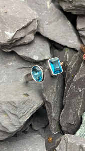 Garnet and Blue Topaz modern style rings