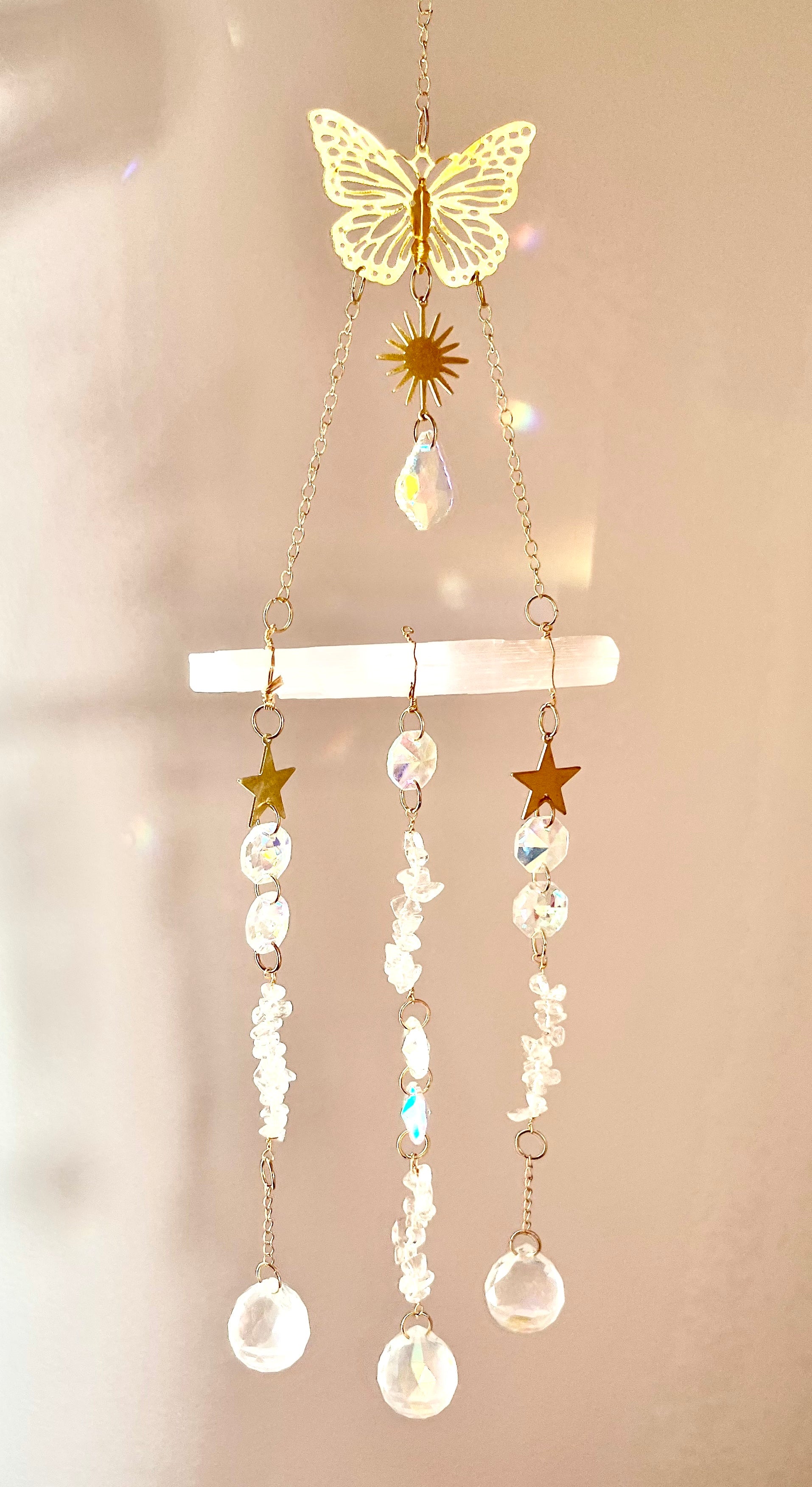 Selenite and Clear Quartz sun catcher with butterfly detail