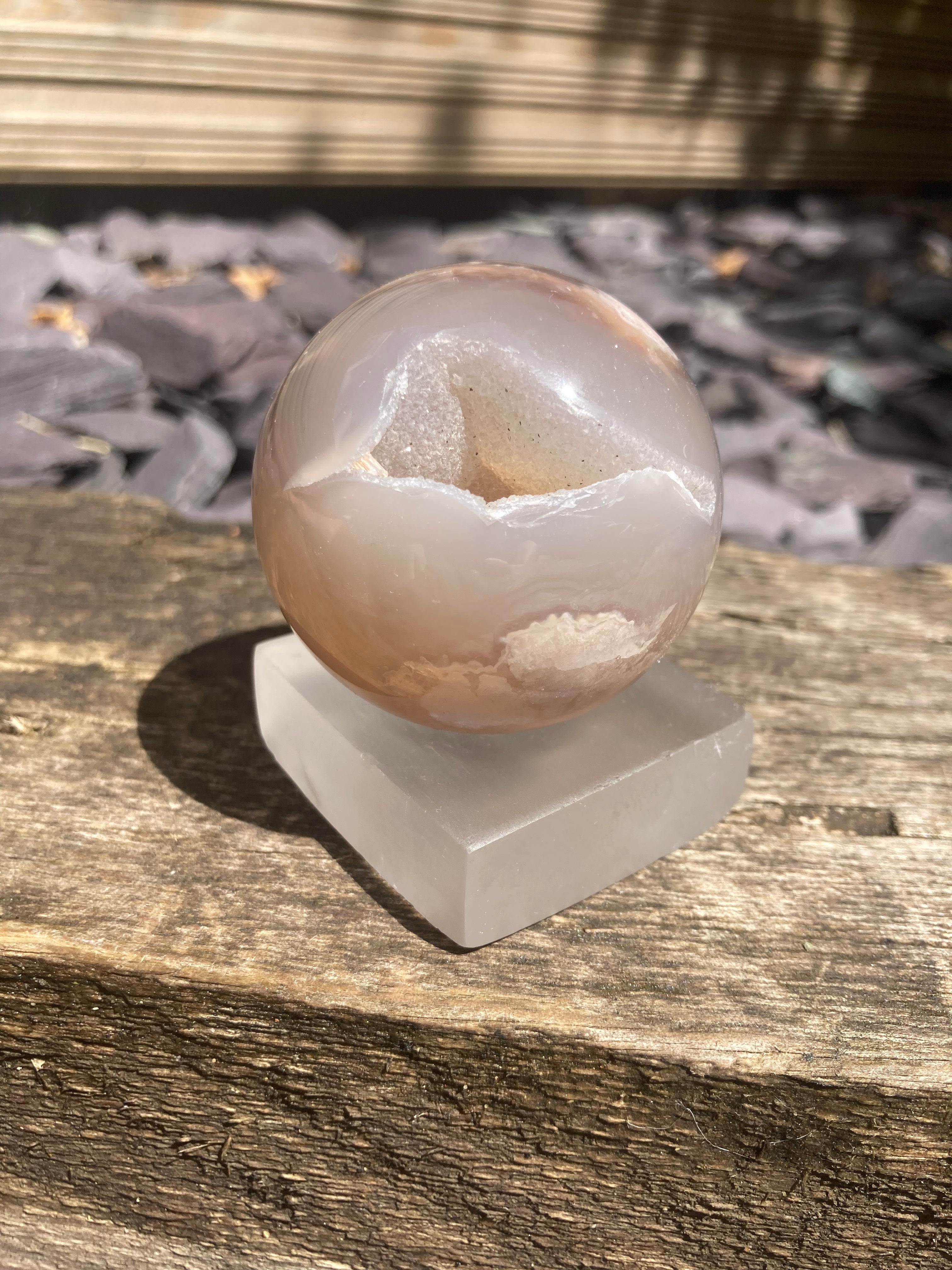 A stunning Flower Agate sphere with sugary druzy