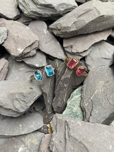 Garnet and Blue Topaz modern style rings